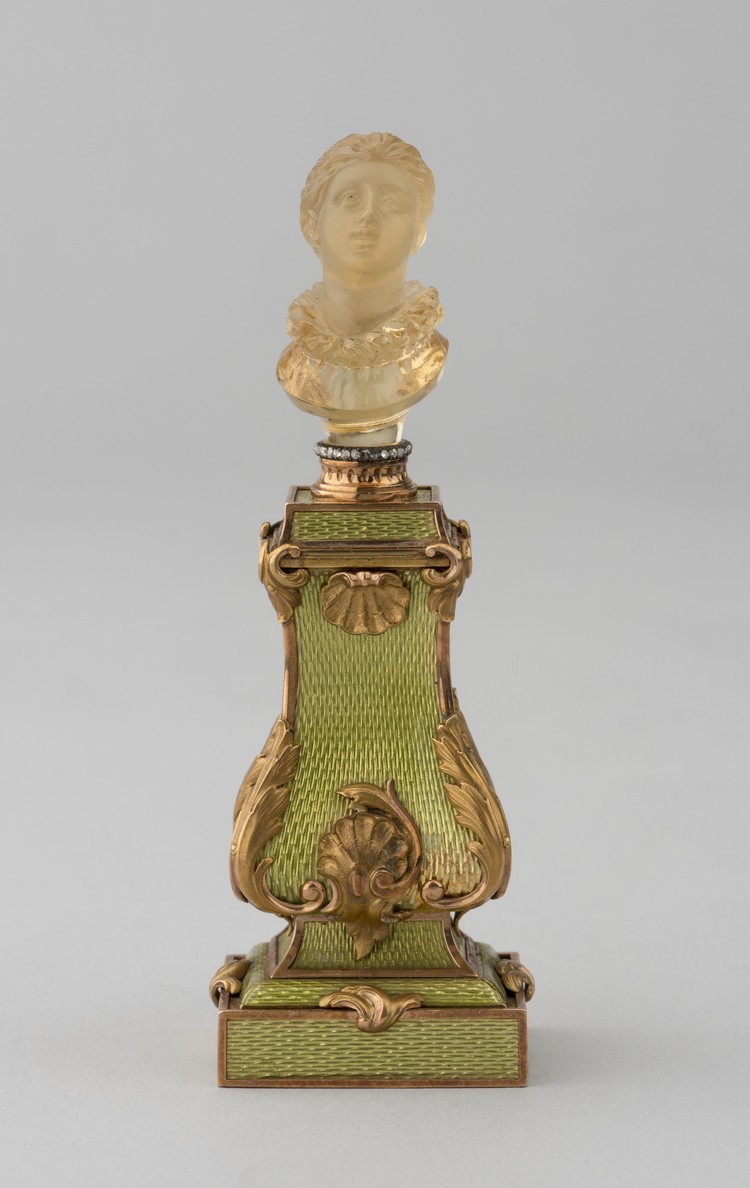 Scent bottle with a top shaped as a woman's head - фото, ракурс 1